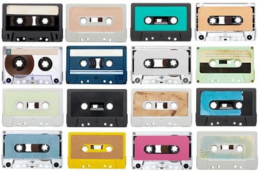 collection of various vintage audio tapes on white background. each one is shot separately-1